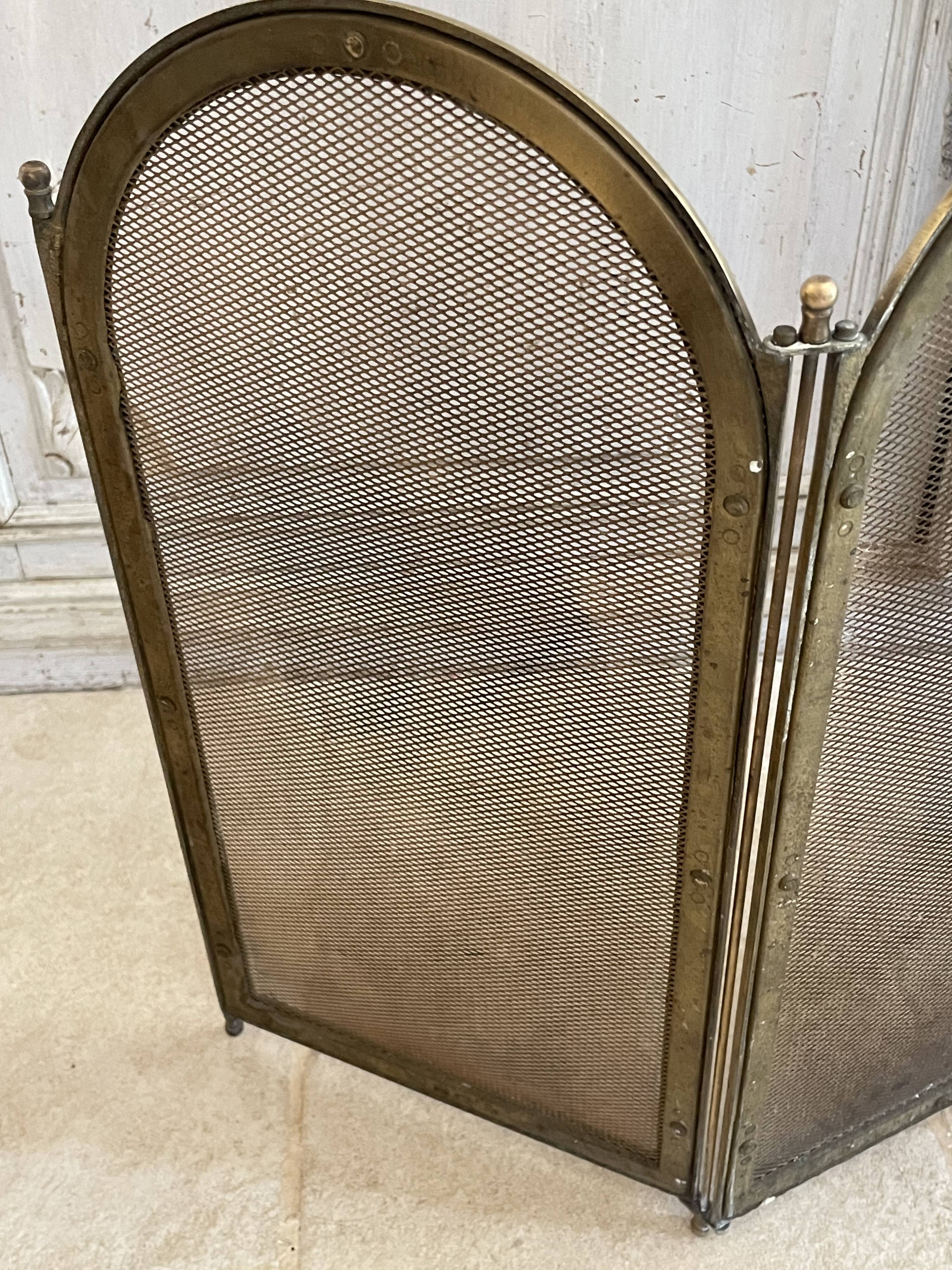 Vintage brass fireplace screen, folding spark guard with 4 panels,