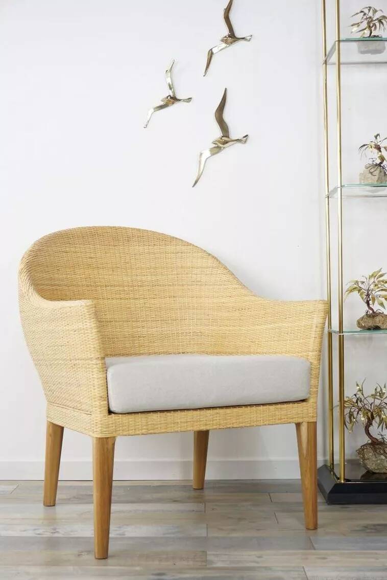 Pair of teak and rattan armchairs