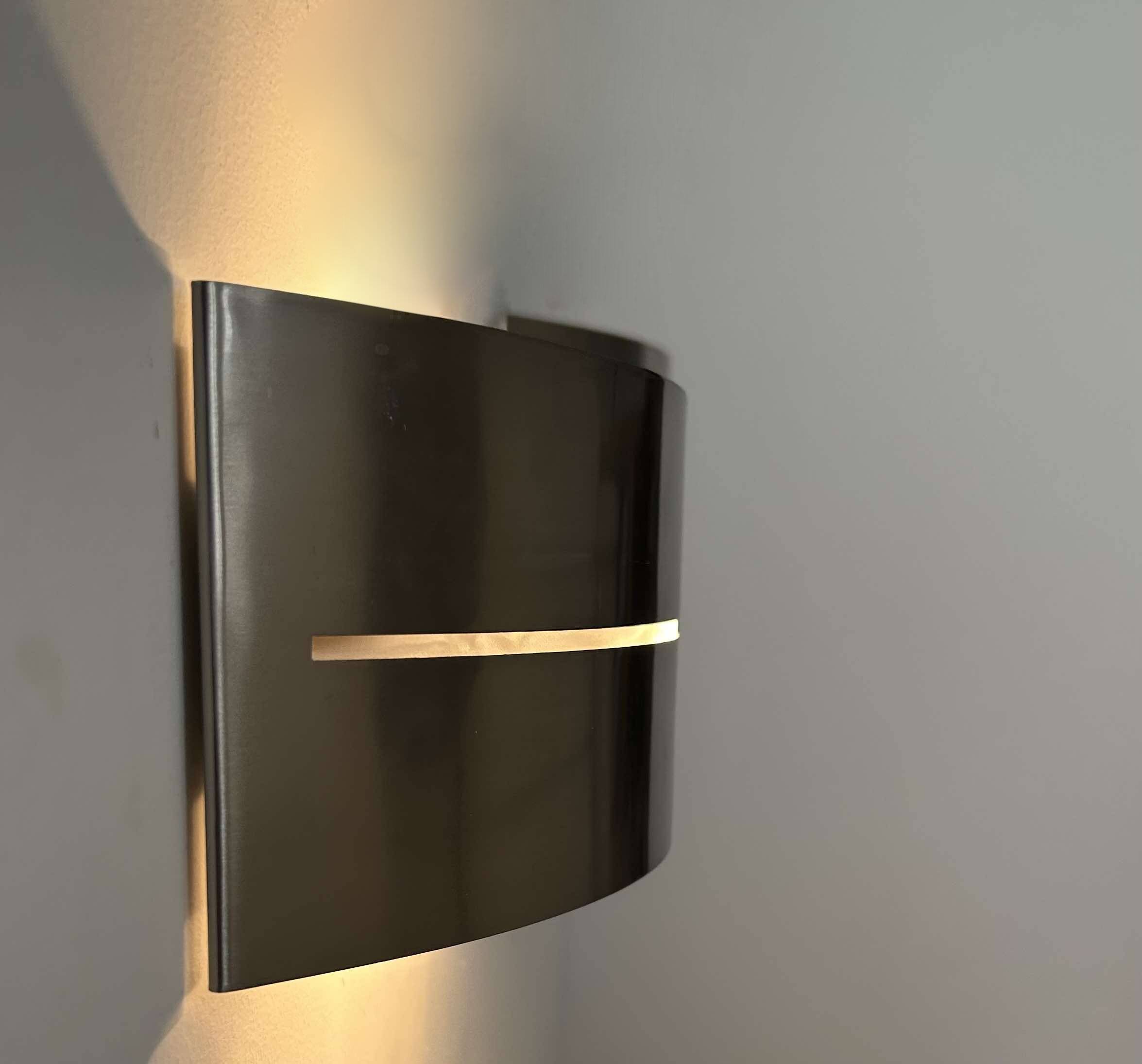 Pair of vintage wall lights, brushed metal, France 1980.