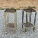 Pair of Hollywood Regency side tables in gold metal and smoked glass.