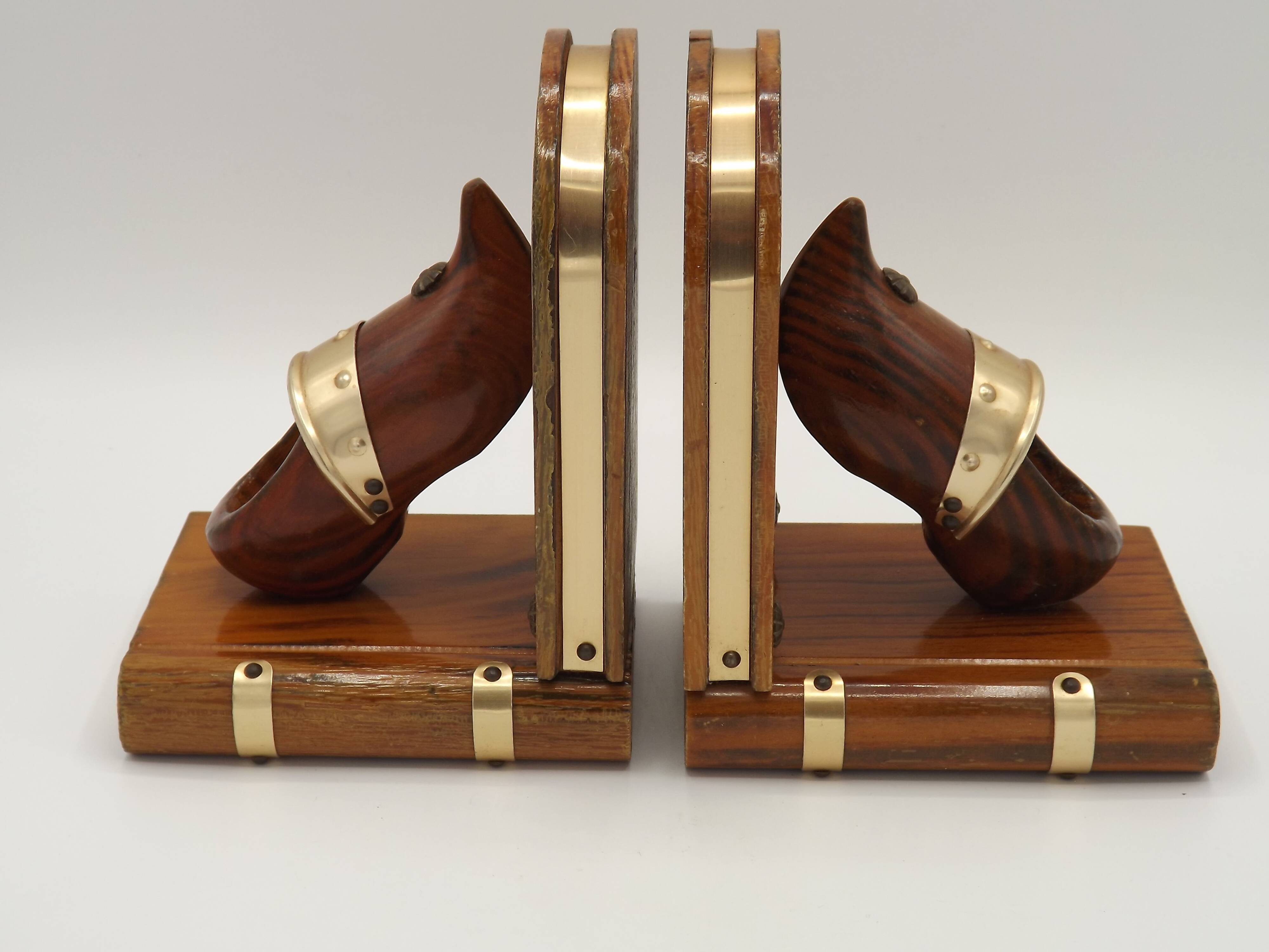 Vintage French Breton wooden bookends hand-carved with book and clog motif.