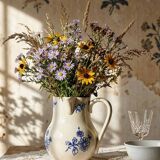 Fine earthenware pitcher with blue decoration, attributed to Saint-Uze, 19th century.