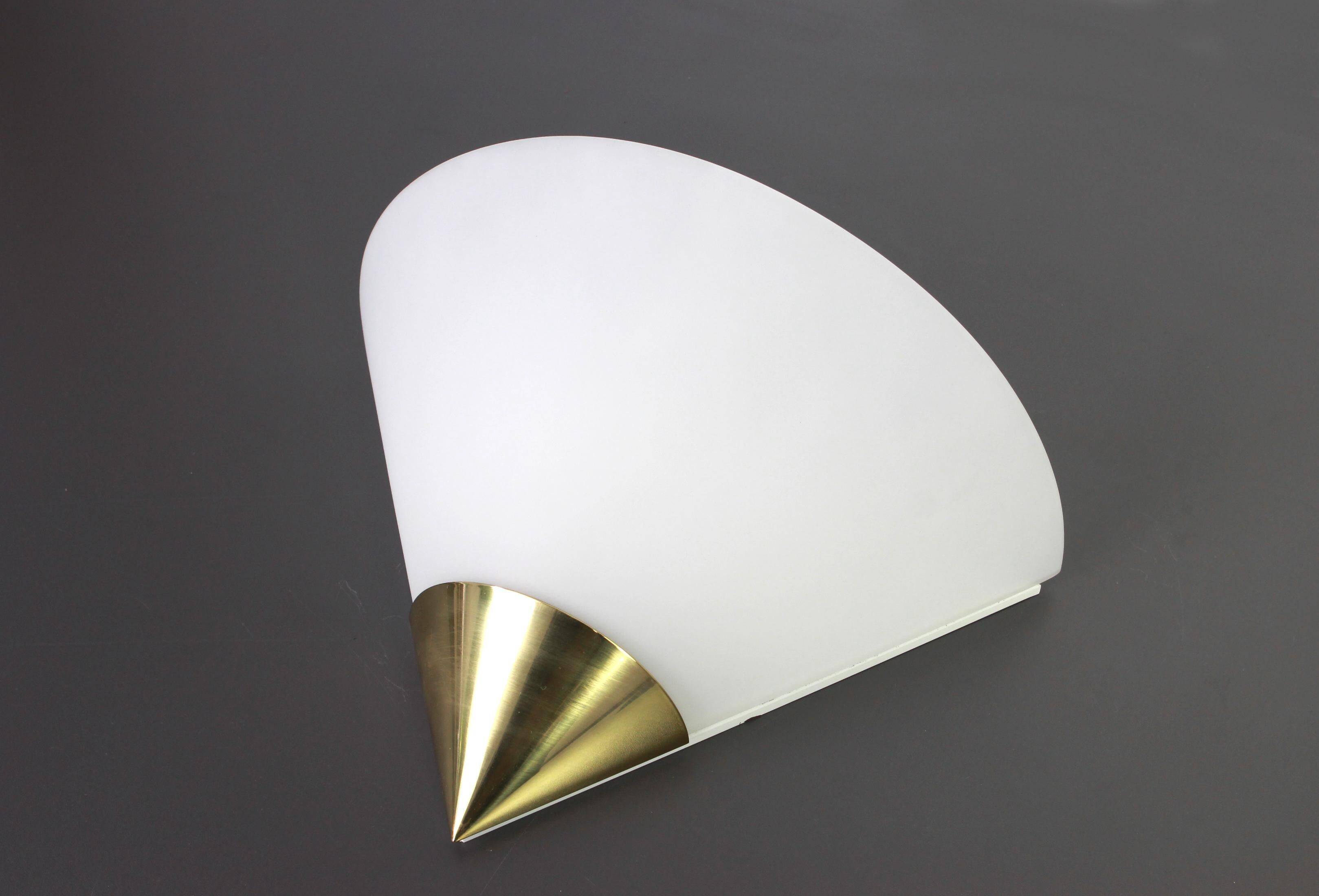 Pair of opaline glass wall lights designed by Limburg, Germany.