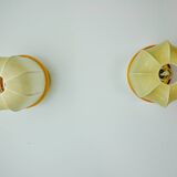 Pair of "cocoon" wall lights, resin and pine, Italy, 1970