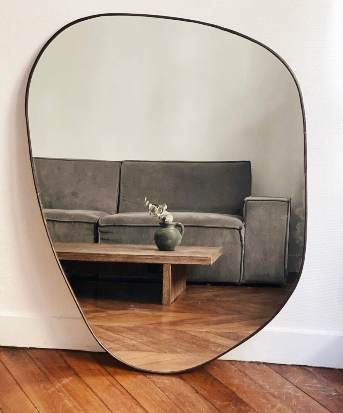 Irregular trapeze mirror organic brass black minimalist