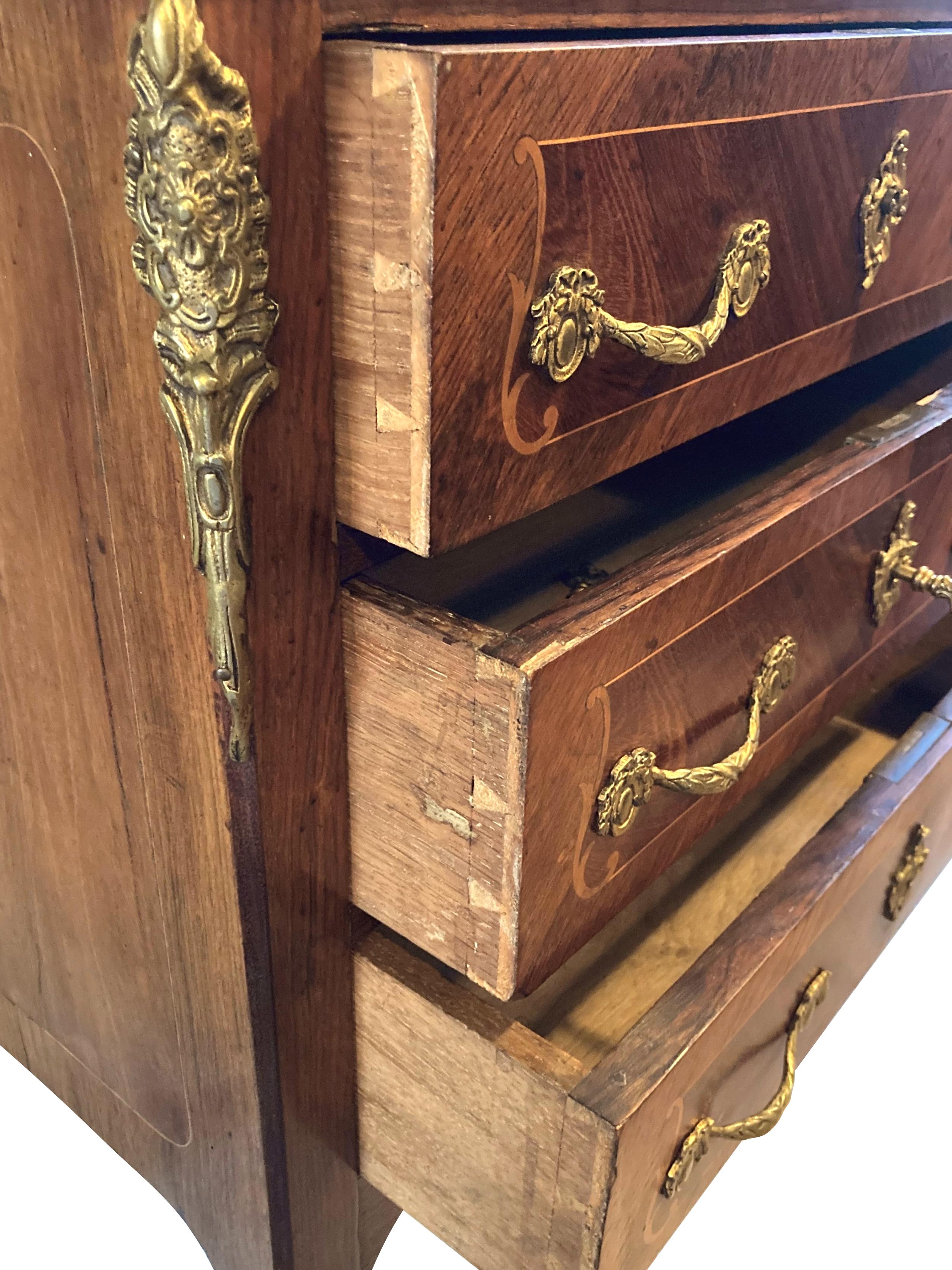 Louis XV chest of drawers in marquetry