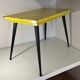 Table in the style of patinated yellow metal Tolix.