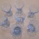 Lot de 7 petits verres à alcool en cristal très finement ciselé bleu.