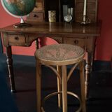 Curved wooden stool and cannage