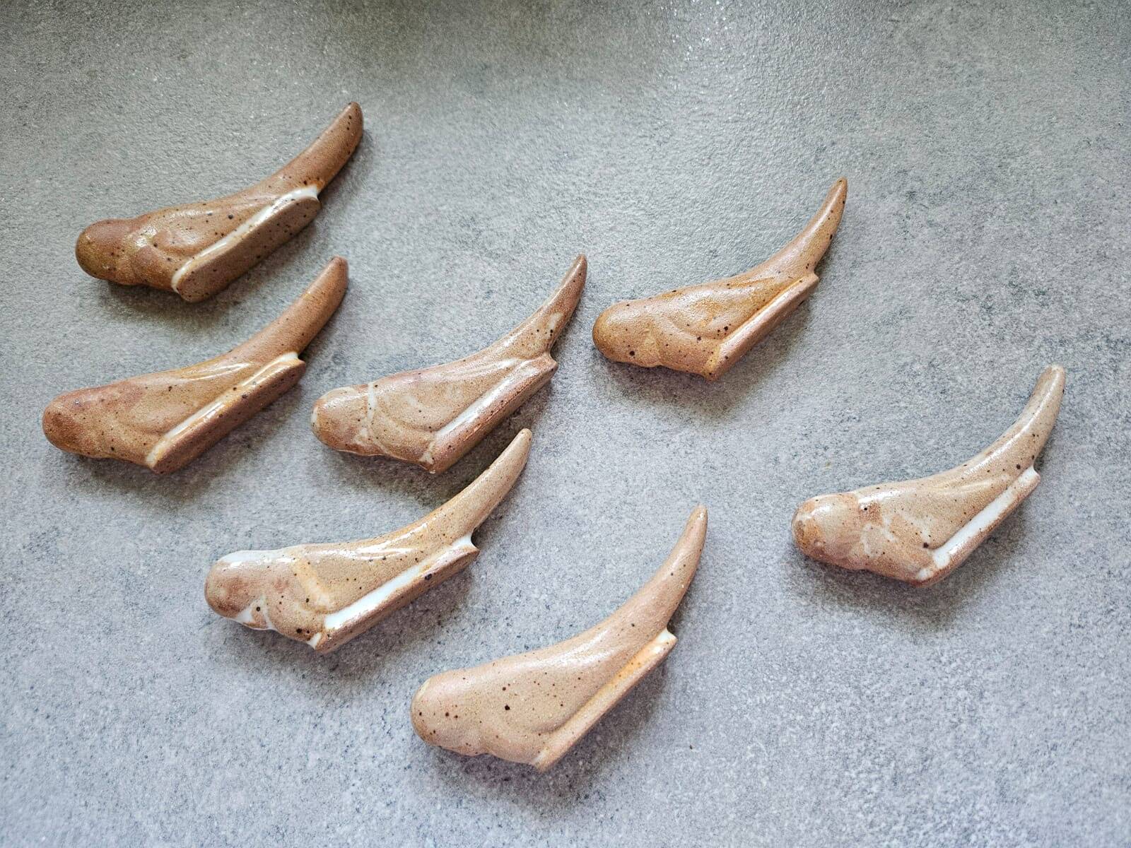 Set of 7 stoneware knife rests - birds