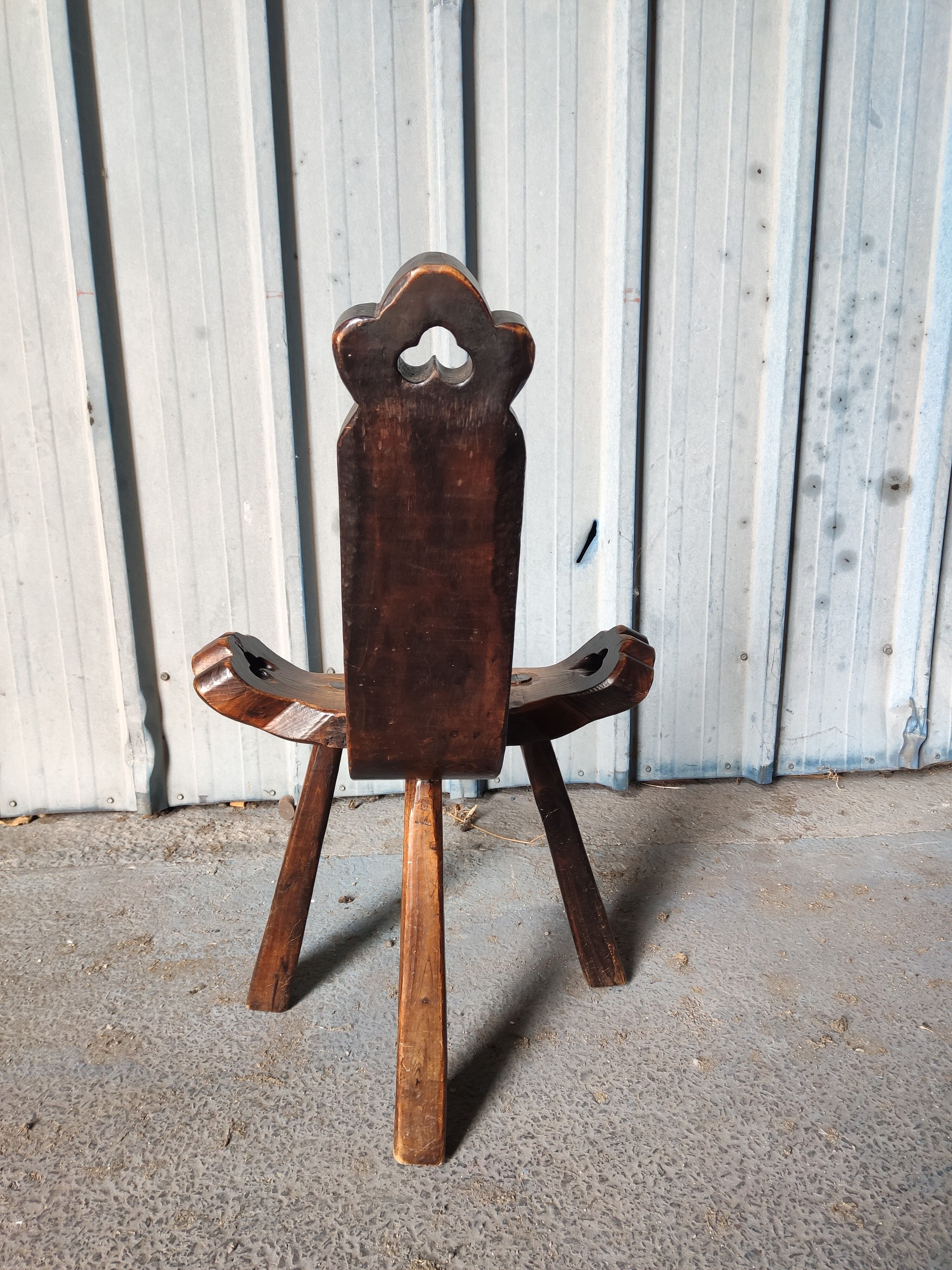 Brutalist tripod chair in solid wood