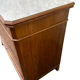 Antique Louis Philippe style chest of drawers with a white marble top.