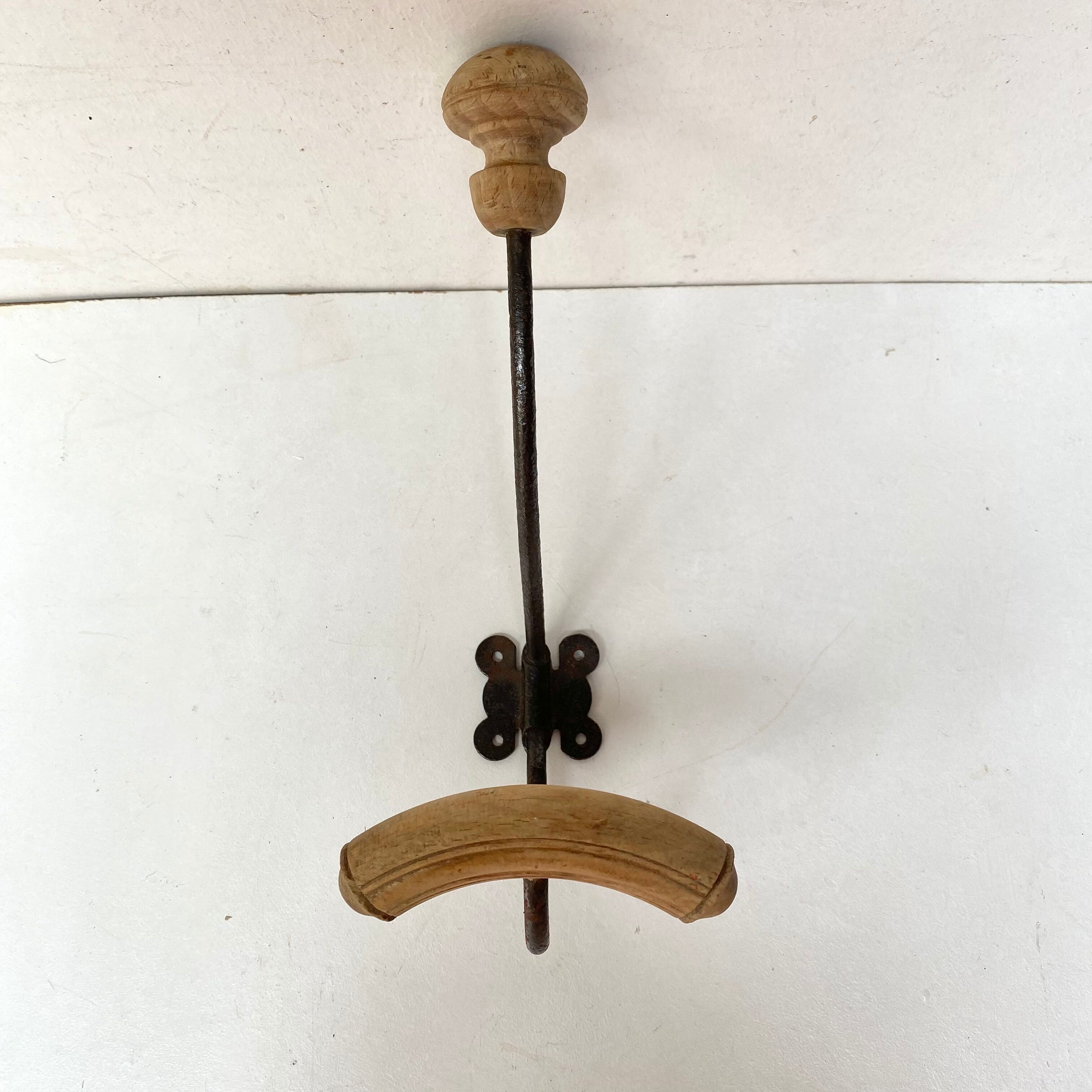Old hook wall coat rack
