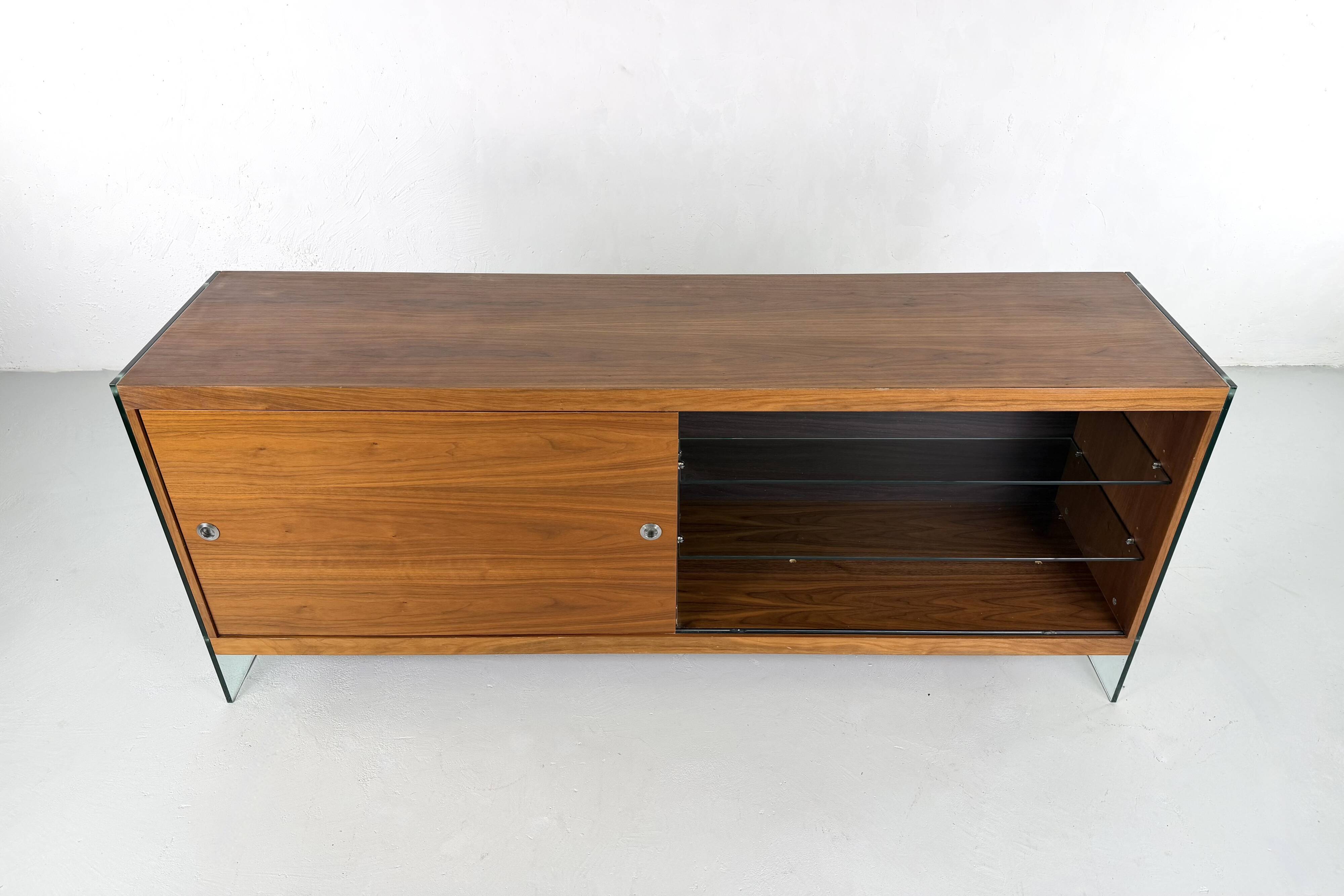 Teak sideboard with glass legs, France - 1990s