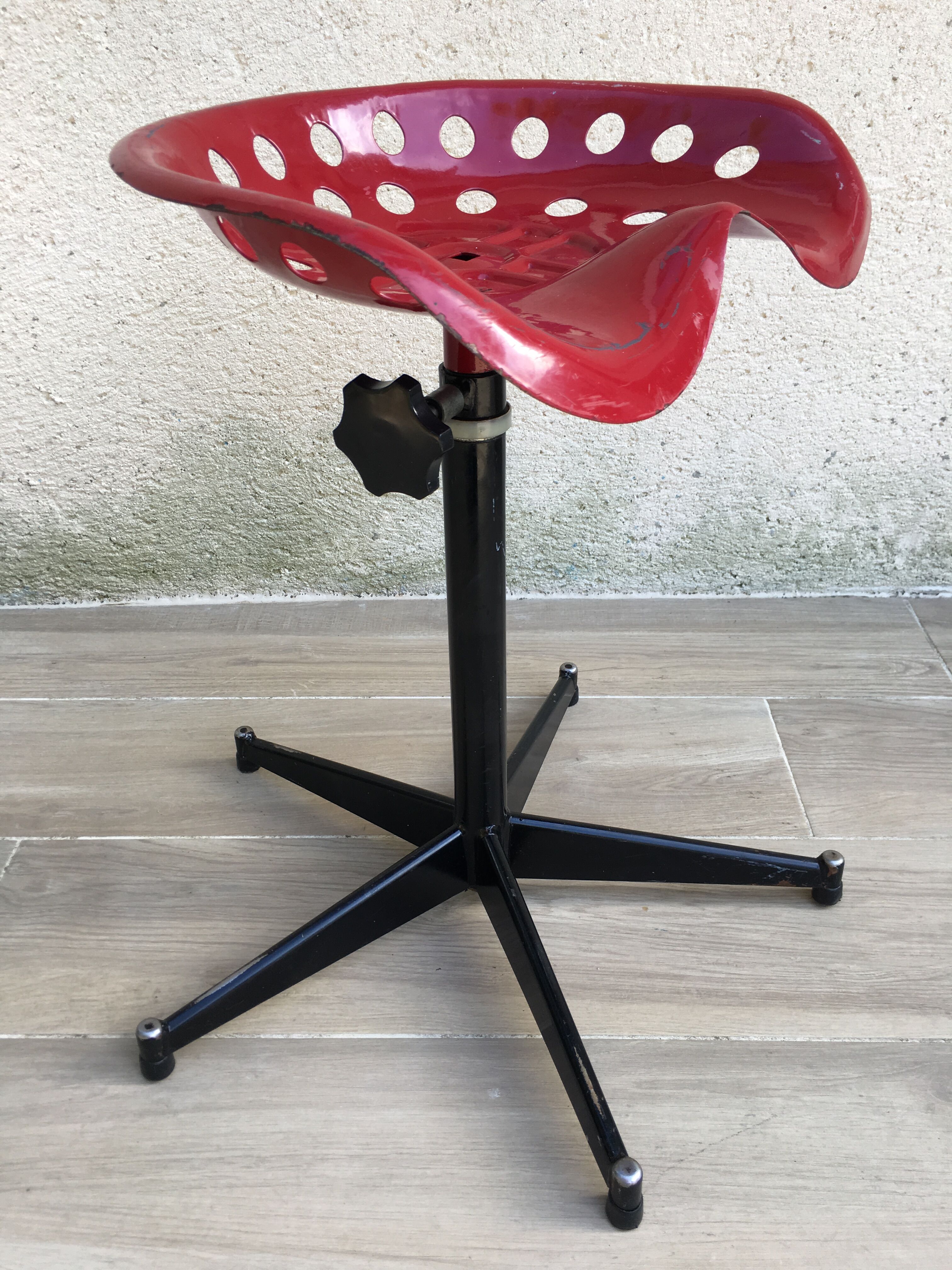 Vintage high stool sitting tractor