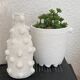 Trio of white vases