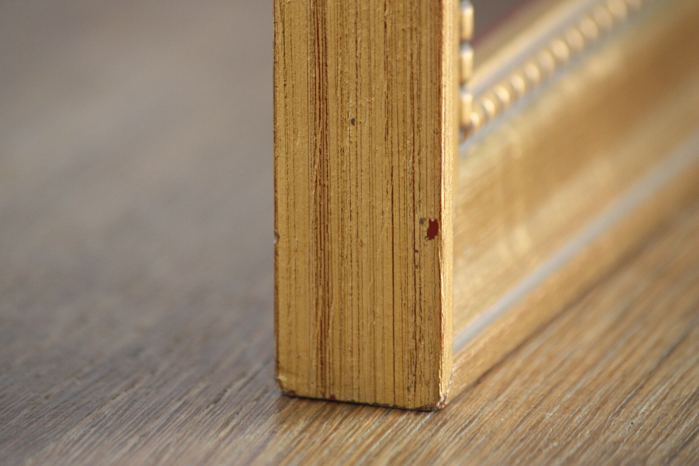 Carved and moulded gilded wood frame