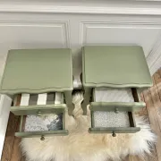 pair of wooden bedside tables