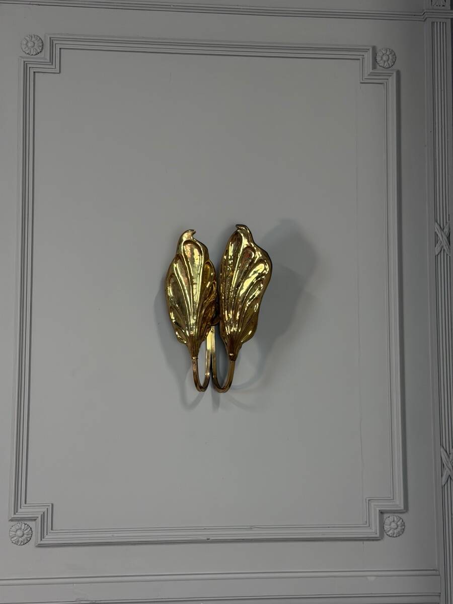 Set of four gilt brass wall lights, Tommaso Barbi, circa 1960.