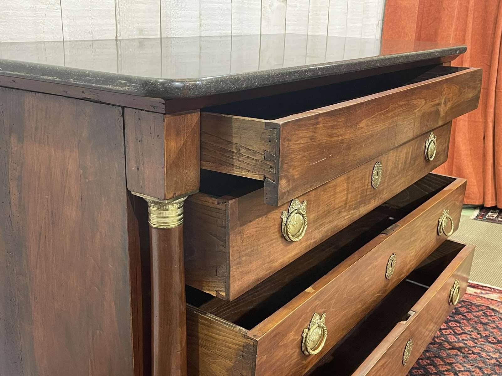 19th century Empire chest of drawers in cherry wood and black marble