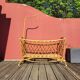 Bamboo and rattan baby cot with canopy.