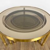 Vintage round nesting tables in gilded bronze with smoked glass