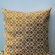 Ochre cushion motifs Seville
