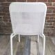 White woven resin garden chair