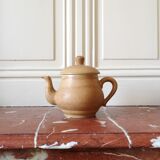 Vintage stoneware teapot and cup, "selfish" tea service, signed