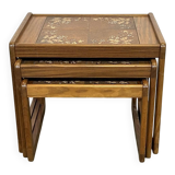 Set of 3 nesting tables in teak with tiled tops.