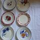 14 mismatched antique dinner plates