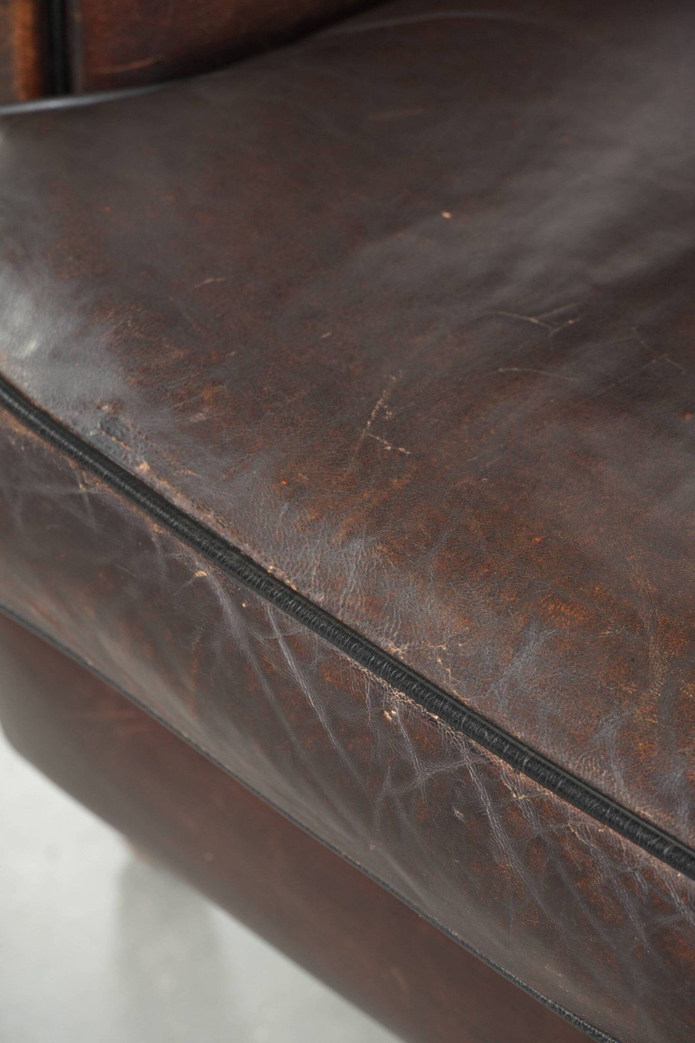 Dark sheepskin club armchair with unique design in English style