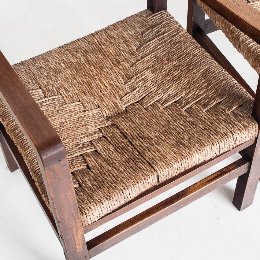 Pair of rustic armchairs in solid wood and straw seats. France, 1940s