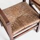 Pair of rustic armchairs in solid wood and straw seats. France, 1940s