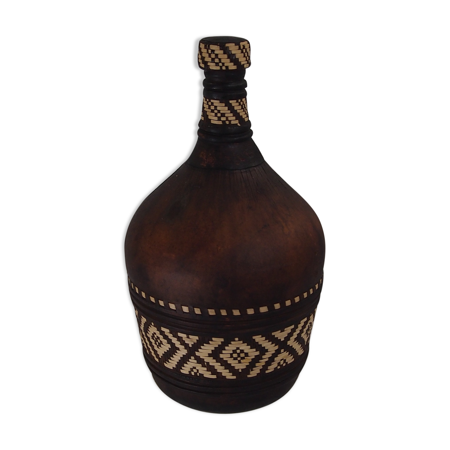 Old bottle in leather