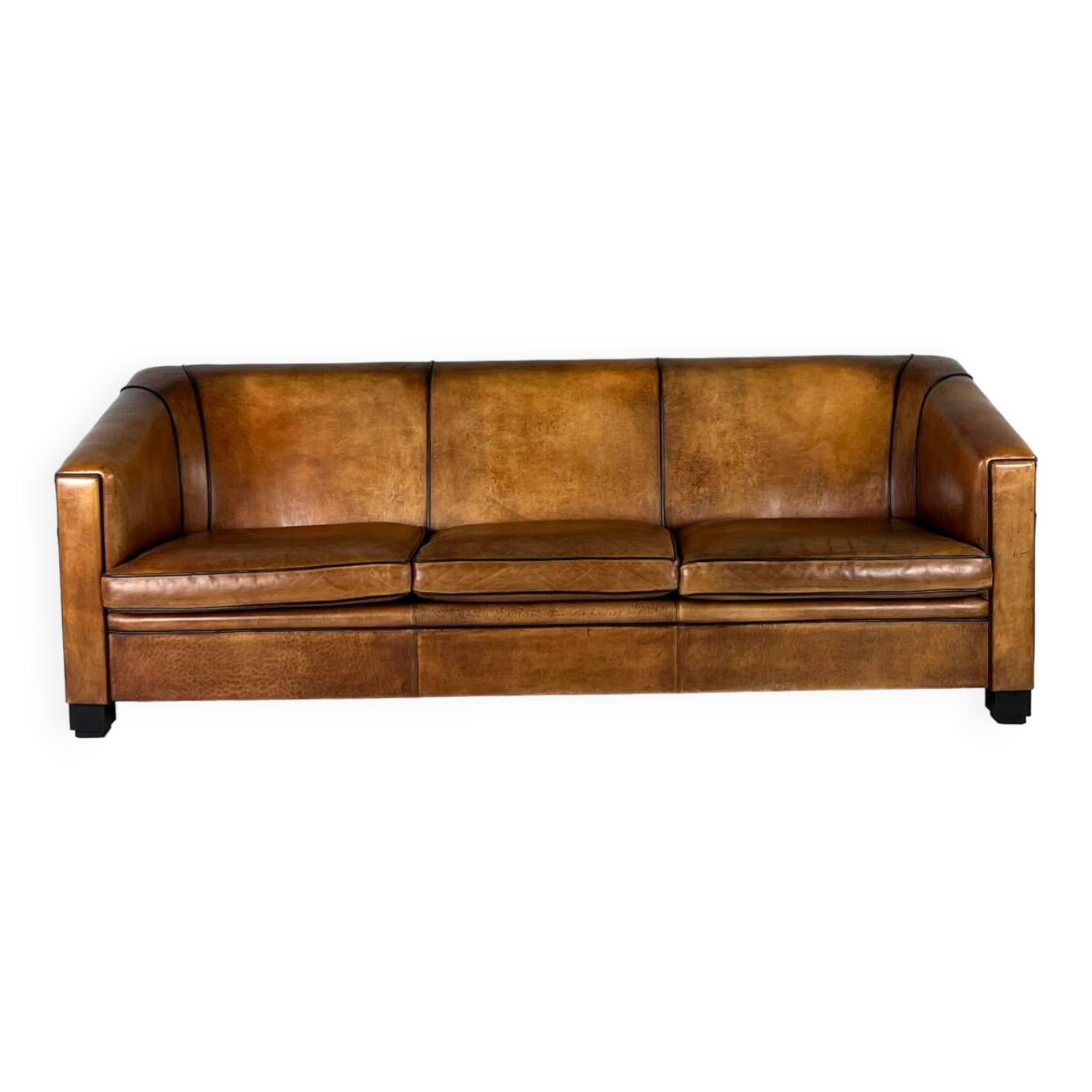 Art deco sofa sheep’s leather