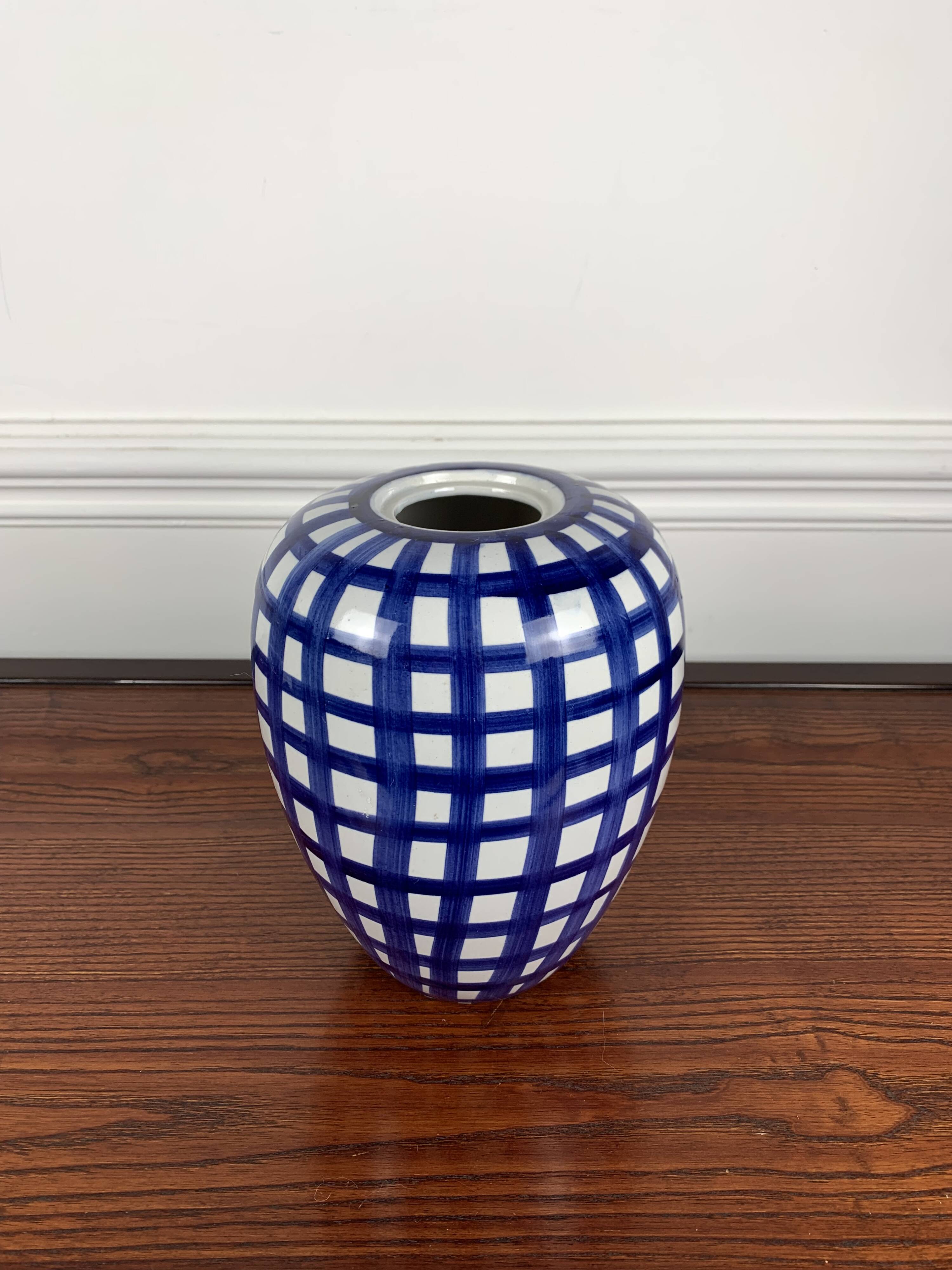 Hand painted blue & white ceramic vase