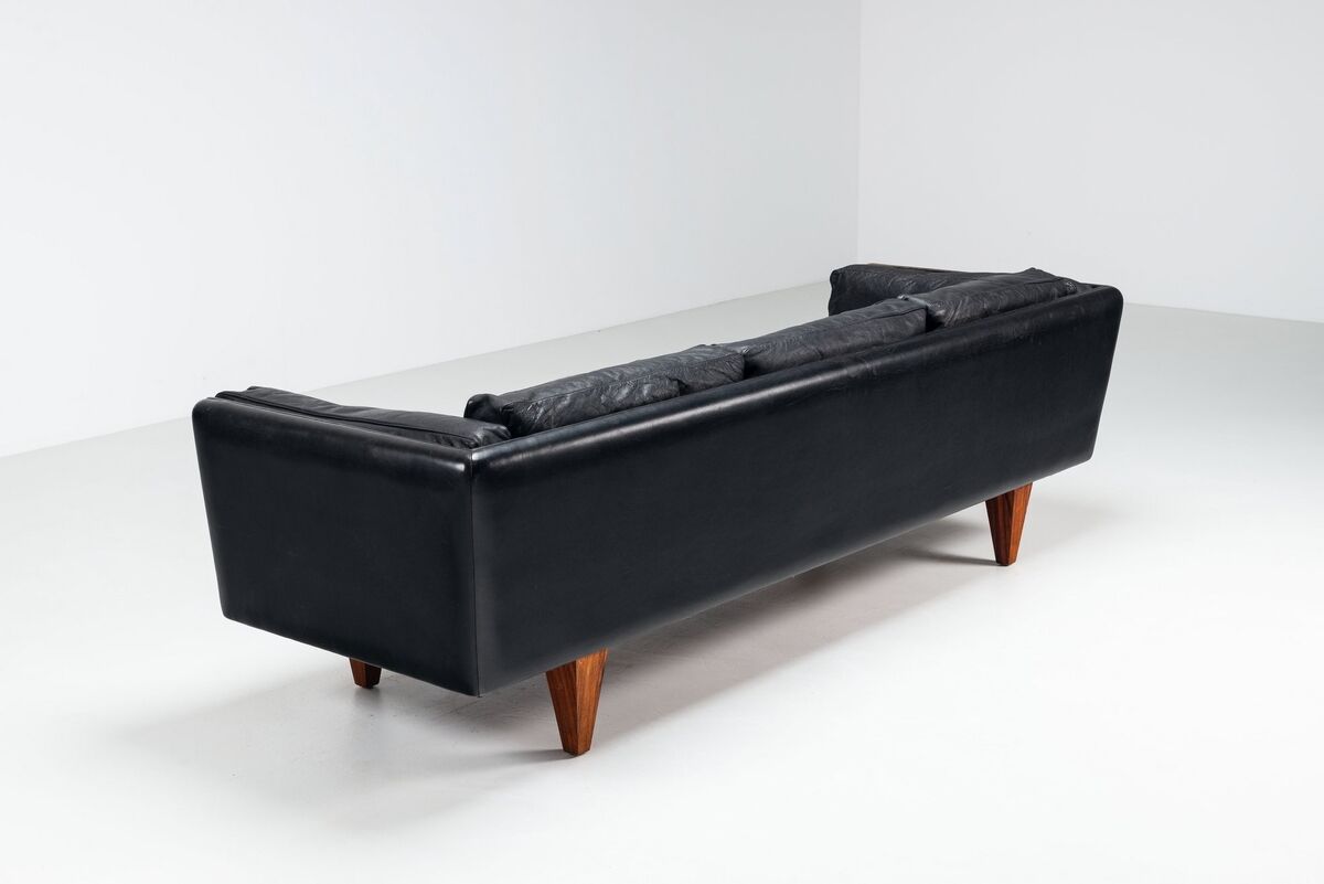 Illum Wikkelso model V11 sofa in black leather by Holger Christiansen, Denmark, 1960