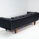 Illum Wikkelso model V11 sofa in black leather by Holger Christiansen, Denmark, 1960