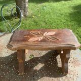 Bench in carved and varnished wood, mountain chalet decoration, old