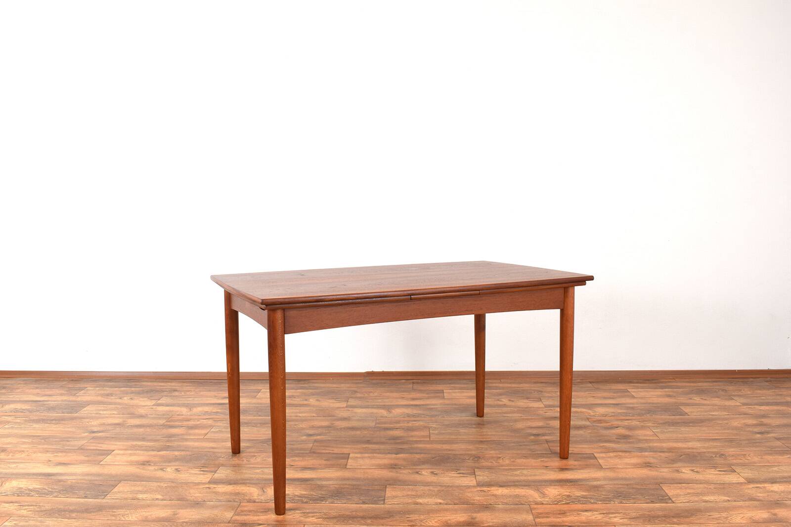 Mid-century Danish teak extendable dining table, 1960s.
