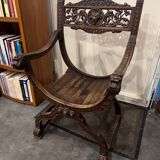 Curule Dagobert armchair in walnut