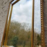 Mirror with glazing bead
