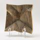 Brutalist bronze pocket emptier