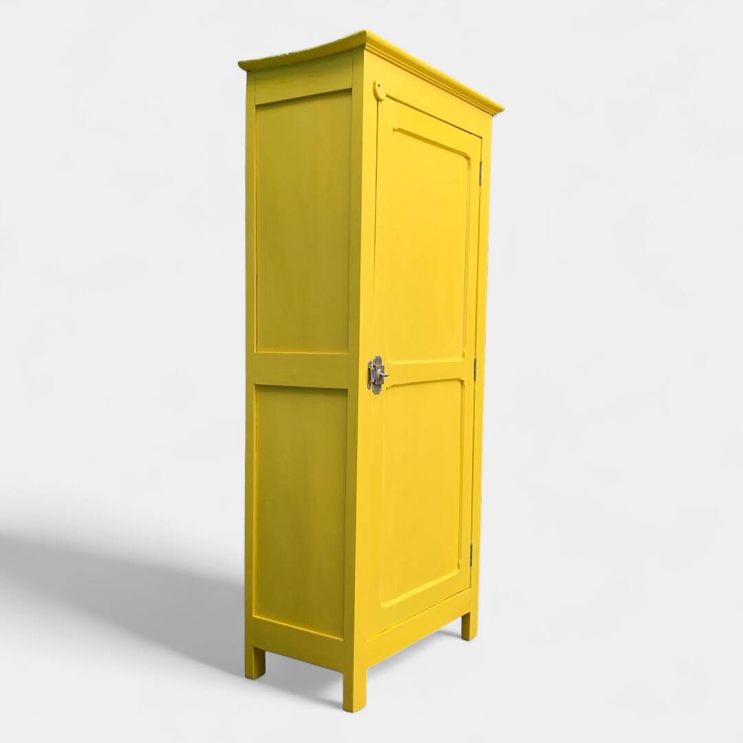 Antique powder yellow Parisian bonnetière wardrobe.