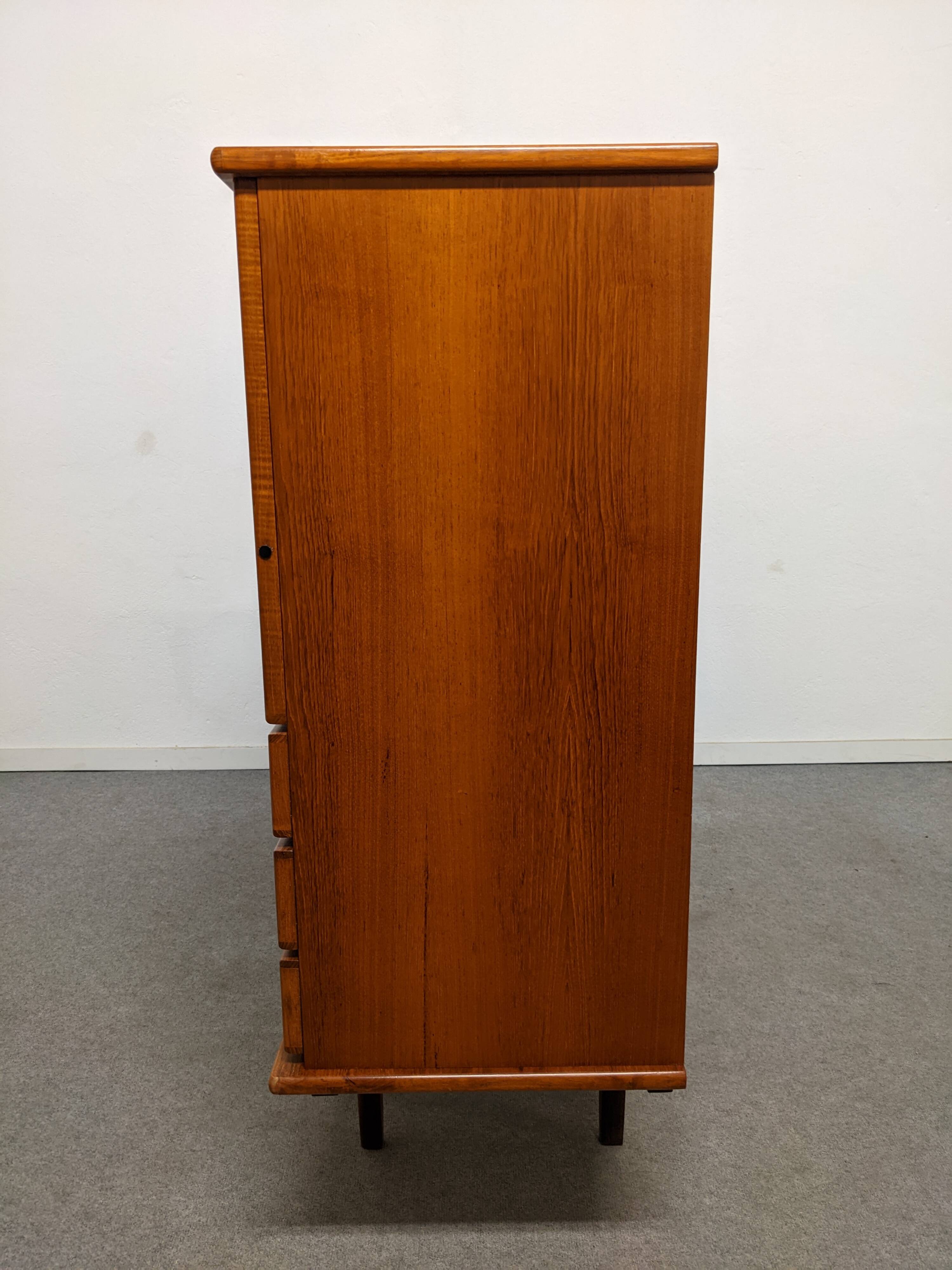 High sideboard, display cabinet and secretary, Scandinavian in teak, France around 1960.