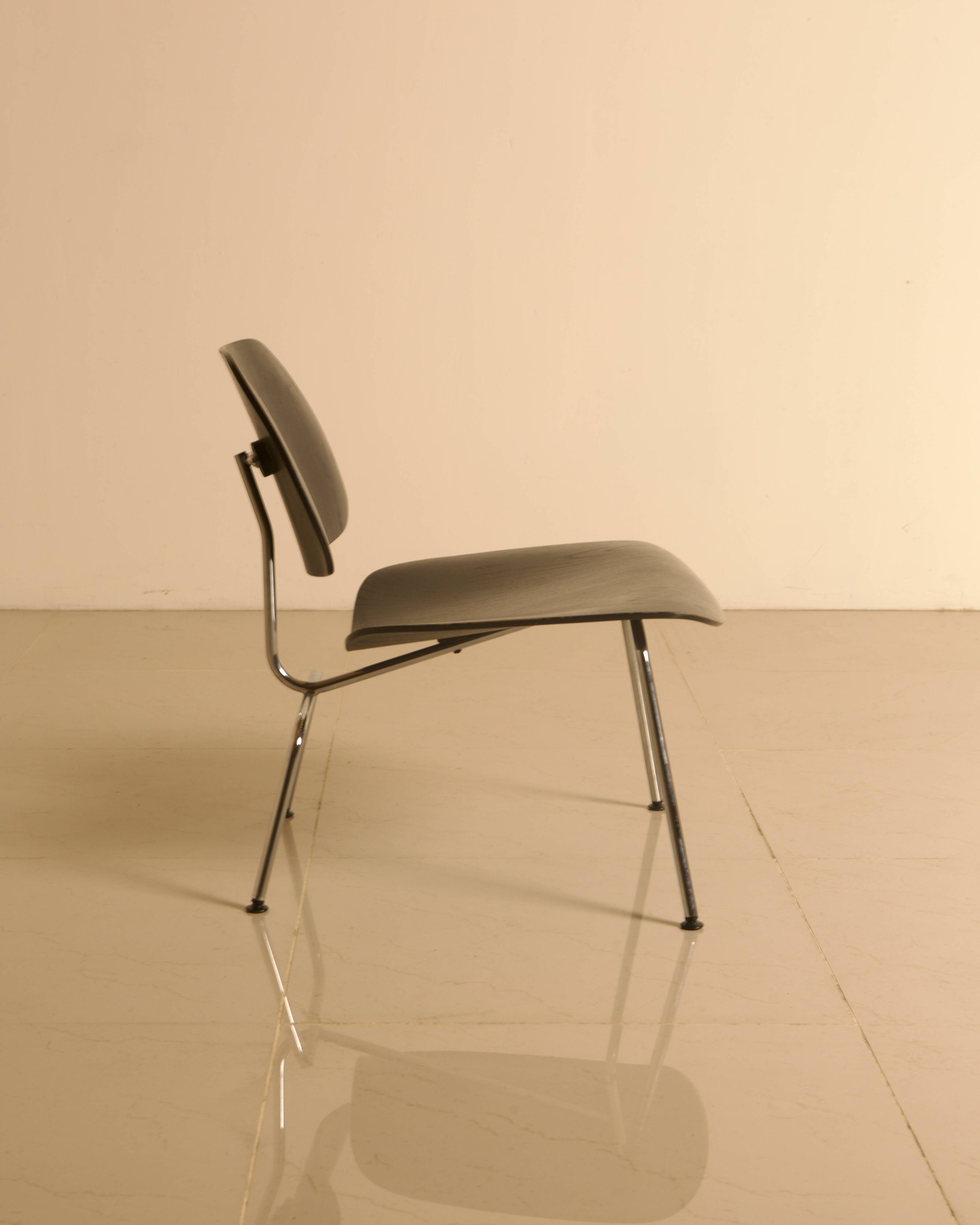 "LCM" chairs in black ash by Charles and Ray Eames for Herman Miller 60s.