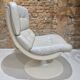 Fauteuil pivotant en cuir patiné gris