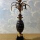 Large pineapple table lamp in carved black and gold wood, France, early 20th century.