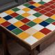 19th century oak farm table with multi-colored ceramic tiles